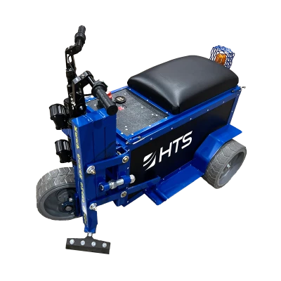 Blue and black motorized HTS Power Shaver with a padded seat, joystick controls, and a basket on the side, on a transparent background.