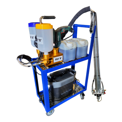 Industrial polyurethane foam injection machine on a blue cart with labeled canisters, pumps, and a power drill, situated in a workshop setting.